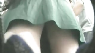 Wonderful woman in green dress has a butt under that skirt