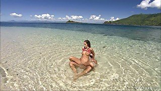 Horny Lauren May fucks in the sea and has a cumshot