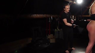 Bondage slave in sensual BDSM fetish sex with spanking and domination
