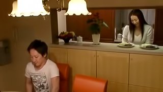 Experienced Japanese chick provides her partner with a nice titjob