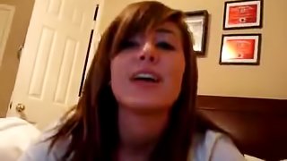 Pretty brunette sucking her BF's hard dick with love