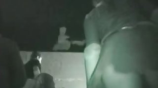 Dancing slut in a dark club shakes her ass for a voyur hidden upskirt cam