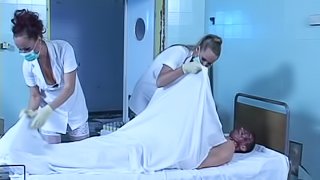 Two horny nurses get fucked by a zombie