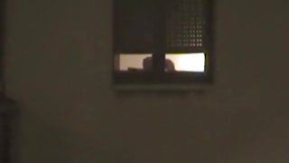 Voyeur tapes the neighbor girl having sex through her bedroom window