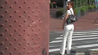 Candid street shots of cute teen in tight white jeans
