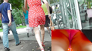 Young babe in cute red dress in the upskirt video