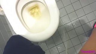 Milf making a mess in public toilet - Pissing on floor and on toilet