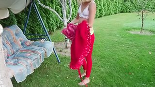 Cute blonde changing her dress