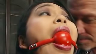 Hot Asian whore mercilessly tied and fucked.