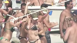 Fabulous babes in sexy bikinis enjoy a blazing party on the beach