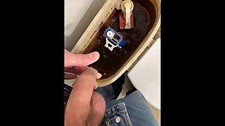 Pissing into foreskin, horny and cum in public toilet