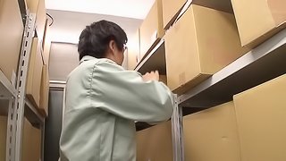Naughty Asian girl gives the guy a blowjob in the back of the office