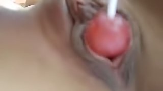 Fucking her hot austrian big lips pussy with a lollipop