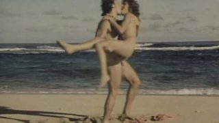 A couple of lusty lovers have a great time banging on the beach