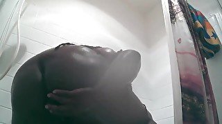Ebony BBW takes a Shower and some dildo action