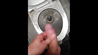 GUY MOANING AND MASTURBATING IN DIRTY PUBLIC TOUILET