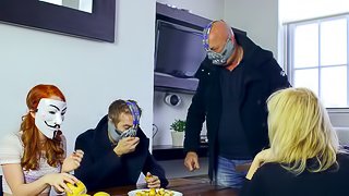 Dude with a creepy mask fucks a redhead and makes her cum on his dick