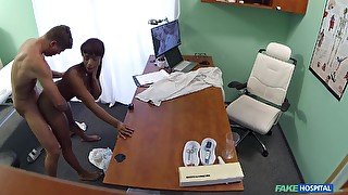 Busty ebony with glasses pleasuring her horny doctor