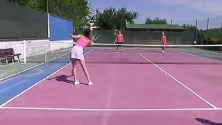 Amazing foursome game with brunettes on a tennis court