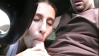 Cute girl sucks cock and fucks missionary for creampie in her bf's car