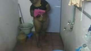 Indian fattie strips and takes a shower in hidden cam video