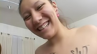 She sucks a black cock and gets her face covered with cum