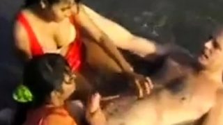 2 Indian girls with white guy in beach have fun blowjob..