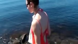 Amateur babe flashing her tits and sucking a cock outdoors