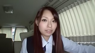 Japanese hottie Yuri Sakano enjoys sucking a cock in a car