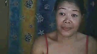 Dark haired Asian granny wanted to striptease for my friend on webcam