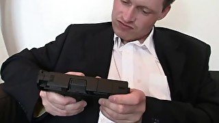 Redhead business lady swallows two big cocks at once