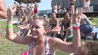 Outdoor reality clip with chicks wearing bikinis having fun at a party