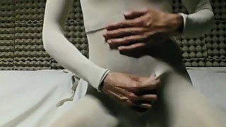 YOUNG GUY IN WHITE PANTYHOSE ENCASEMENT MASTURBATING