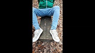 Public pissing jeans in forest