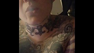 Chubby tattooed big tits almost got caught smoking naked.