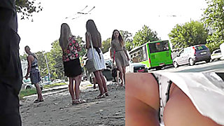 Slender babe with sexy legs in the candid upskirt clip