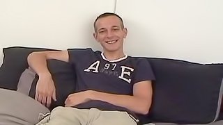 A hot gay guy teases his asshole while stroking his hard cock