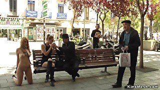 Naked blond hair lady kneeling in public streets