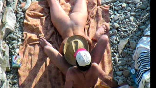 Voyeur beach sex movie of a half exposed pair