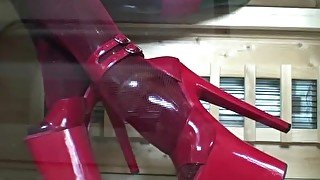 Latex Girl IN Black Catsuit And Red Fishnets Enjoys Rubber Wellness With Gas Mask