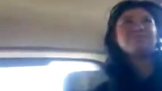 Chubby brunette girl with shaved pussy has doggystyle sex in her man's car