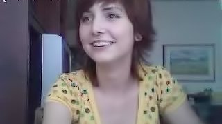 Short Haired Beauty Sucking Her Man's Cock for the Webcam