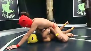 Two masked girls fight on tatami and have doggy style sex with a strapon