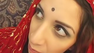 Indian brunette with tattoo jumps on fat cock
