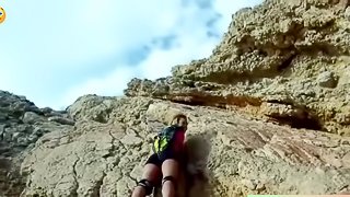 Petite blonde in black shorts gets her wet pussy pounded during rock climbing