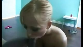 Blonde woman sucking black cock