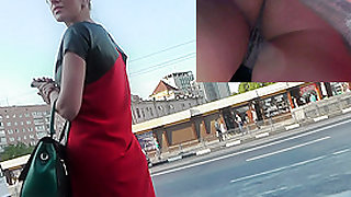 Public upskirt of the blonde dame at the bus station