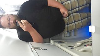 Chub stroking in an airplane bathroom