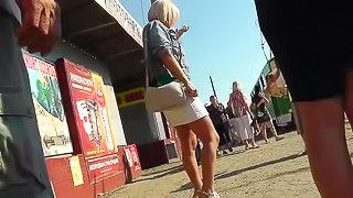 Innocent chick is demonstrating her ass