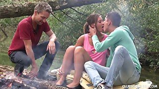 Lovely teen Naomi Bennet is eager for dirty threesome outdoor sex